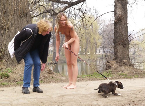 nakedgirlsdoingstuff:  Walking the pup.  Of course the puppy gets all the attention.