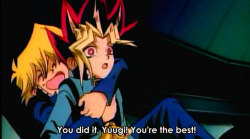 dragontamer05:  Joey coming to celebrate with Yugi that he won.