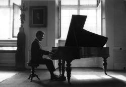 musician-photos:Leonard Bernstein at Chopin’s piano in Warsaw