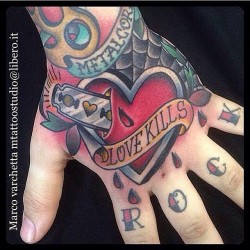 tattoosnob:  Love Kills - http://ift.tt/1vJyUKh