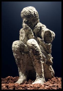 sixpenceee:  Body cast of a victim of the Vesuvius eruption of