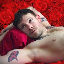 gaycomicgeek: Is that a bed of roses? Oh wait, it’s just Photoshop.