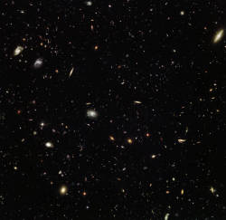 ohstarstuff:  Hubble peers billions of light years away, uncovering