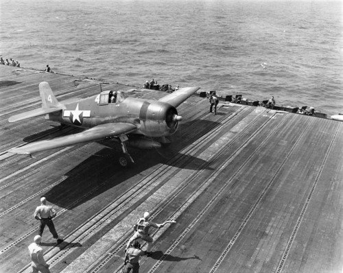 usaac-official:  An F6F of VF-16 prepares to launch from USS