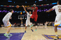 nba:  LeBron James #6 of the Miami Heat passes the basketball