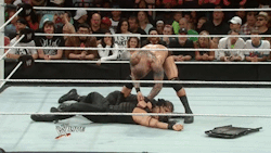Randy Orton violent stripping Roman Reigns. He must really hate