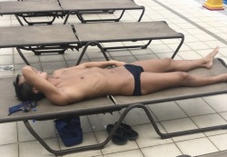 uniboysg:Lean hottie spotted sunning beside the pool. HOT!!!