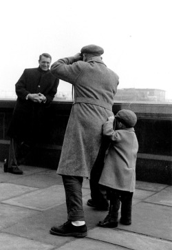 ICON :. Cary Grant posing for a fan, c. 1950s. 