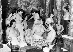 The backroom of a bordello? Fascinating vintage photo.