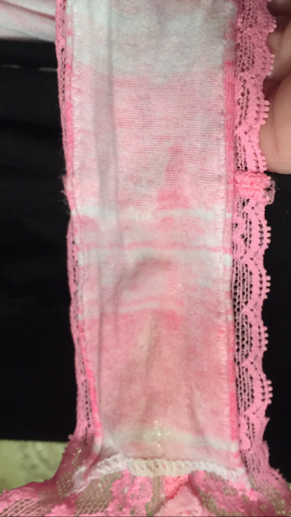 jigglybeanphalange:  Made these pink panties wet while working today. I strategically crossed my legs at my desk; grinding against the pressure between my thighs while taking care of business. Some cream leaked through the lace and into my leggings leavin