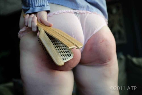 jerrybear:  Sometimes the butt wins. From Assume The Position Studios. That’s Alex Reynolds. That was a hairbrush and that was her first shoot as a spanking model. Alex will be at the Texas All State Spanking Party, June 20 - 23 in Dallas, Texas. Click
