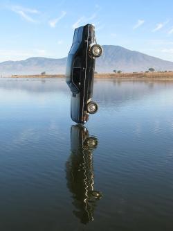 blazepress:  A car the moment before it hits the water. 