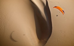 Cast a smiling shadow (parasailing over the sand dunes of Mozambique)