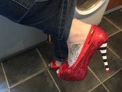 britdscouple:  Showing of a pair of her MANY iron fist shoes.