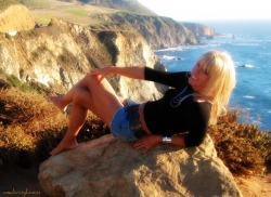 Me, lounging on the rocks along the Pacific Coast Highway near