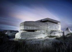 architizer:  Check out these Eerie Photos of Ruinous WWII Bunkers! 