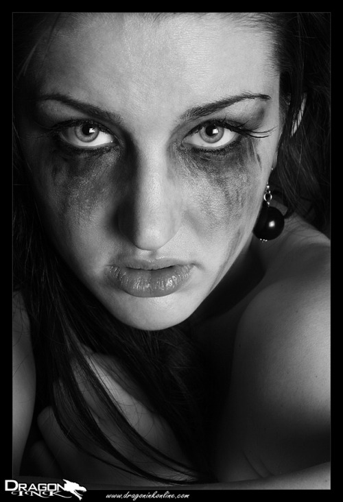 This image fits my mood more lately. It was shot back in probably my first year of shooting around 2008/2009. Other images in the series showcase the full concept but this image I found to be the strongest. I wanted a dark feel. Smudged makeup. Raw emotio