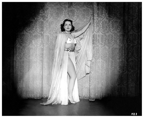 Marie Durand   Appears in a publicity photo from Duke Goldstone’s 1949 Burlesque film: “HOLLYWOOD BURLESQUE”.. A documentary-style recording of a complete Burlesque show,— as filmed at the ‘HOLLYWOOD Theatre’; located in San