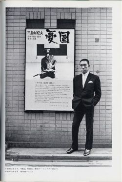 runawayhorses:  Yukio Mishima in front of the poster for Yukoku