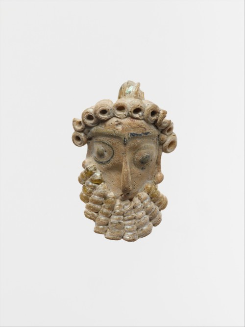 ancientart:  Phoenician or Carthaginian glass head pendants. The first dates to theÂ 5th century BCE, the second to theÂ mid 4thâ€“3rd century BCE, the third to ca. 450â€“300 BCE, and the fourth to theÂ 5th century BCE. Courtesy & currently located