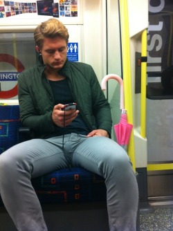 guys-with-bulges:  Tube Bulge. And A Very Pink Brolli. (via Sticky Street