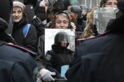 untrustyou:  FACE TO FACE: A demonstrator held a mirror to reflect