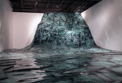  Baptiste Debombourg created a frozen river out of cracked windshields. 