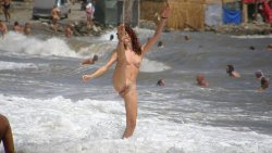 real-naturist-beach:  nudists playing in the sea. Ladies, if