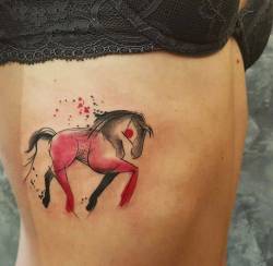 tattoofilter:  Sketchy style horse tattoo on the left side ribcage.