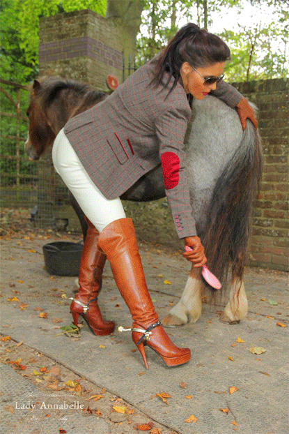 I’m wearing cream leather jodhpurs, stiletto boots, tweed jacket, leather gloves and of course my vintage spurs!