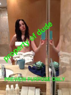Alison Brie topless (reflection) selfie.