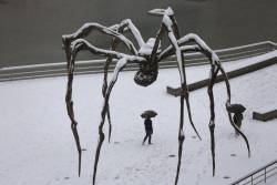 ruckawriter: Photo: Bilbao, Spain  A man walks under a snow-covered