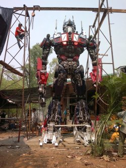 blazepress:  Optimus prime made from car parts in Thailand. 