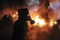 boyirl:  Anti-government protesters gather at a barricade at