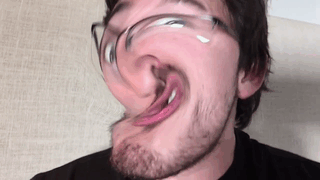 working-on-a-username:  Oh no, someone let Mark play with Photobooth again [X]