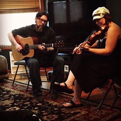 <p>Loved this moment at #nashvilleflatpickcamp with @adamschlenker I was proud to play with him in the staff concert and proud to know him all the time. Also, it appears I am now a hat person. Thanks to @flipsidehats for all the upcycled cuteness. #martinguitar #fiddle #flatpicking (photo stolen from Adam Schlenker) (at Fiddlestar)</p>