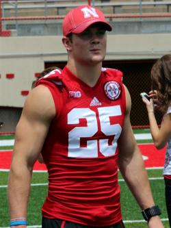 Nathan (Nate) Gerry - Nebraska Cornhusker Interview with some nice front/back shots of him playing: https://www.youtube.com/watch?v=gT8jPgFisQ0