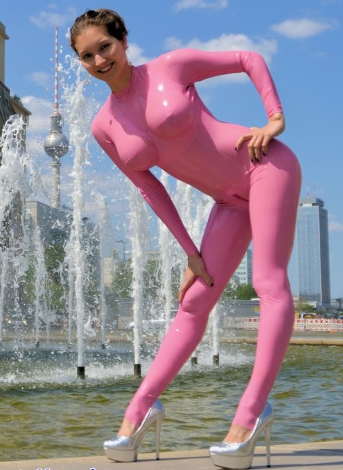 Very nice pink latex catsuit!