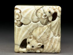 historyarchaeologyartefacts:An ivory seal with a pair of bats