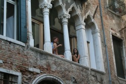 rouxet:  i saw these two girls while riding a gondola in venice.