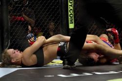 ufcmmapictures:  ‘Rowdy’ mom: Ronda Rousey holds