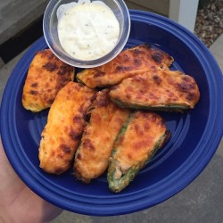 Appetizer of cream cheese and cheddar jalapeño poppers from