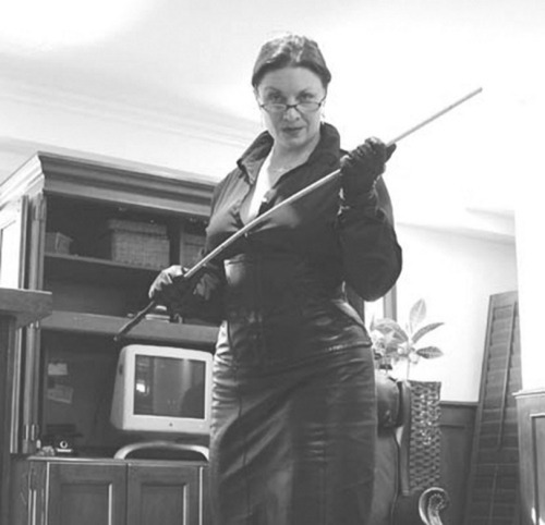 johneeee14:  domme dominatrix leather bitch cane whip gloves mature  