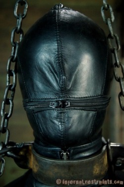 ferranartist:  bondage-post:  Leather mask and corset bondage