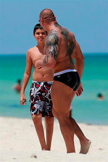 Uff Batista letting it all hang out in those tight swim trunks!
