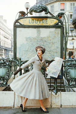 vintagegal:  Model wearing a gray Dior suit outside the Louvre