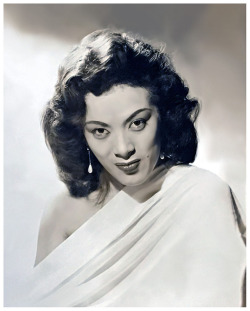 Tura Satana            ( aka. Tura Luna Pascual Yamaguchi )A very early 50′s-era promotional portrait photo..