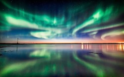 Heavenly reflection (Aurora Borealis over Keflavik, Iceland)