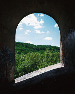 destroyed-and-abandoned:  View through an abandoned viaduct.