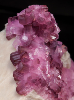 underthescopemineral:  Rubellite, Feldspar Group      A(D3)G6(T6O18)(BO3)3X3Z,KAlSi3O8